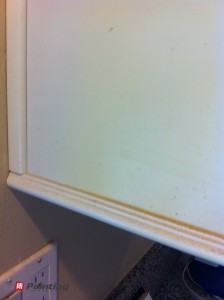 yellow stains on cabinets before